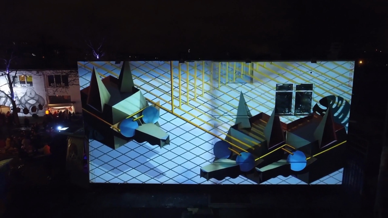 A 3D projection mapping of geometric forms on a wall at night in Berlin, filmed on site